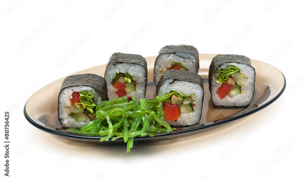 rolls and chuka salad on a plate on a white background rolls and chuka salad on a plate on a white background