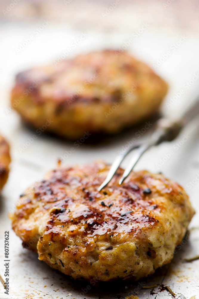 chicken burger on a baking sheet