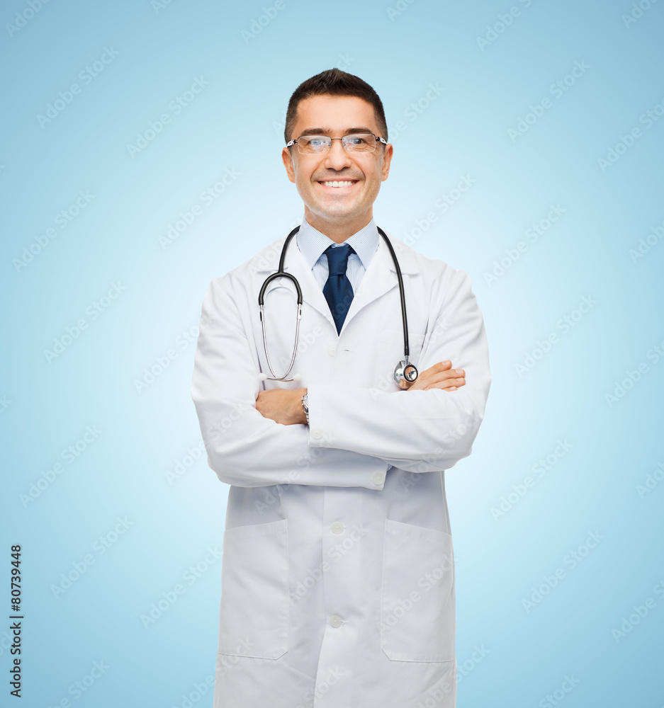 smiling male doctor in white coat smiling male doctor in white coat