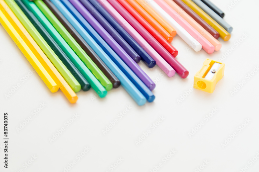 Row of color pencil crayons Row of color pencil crayons