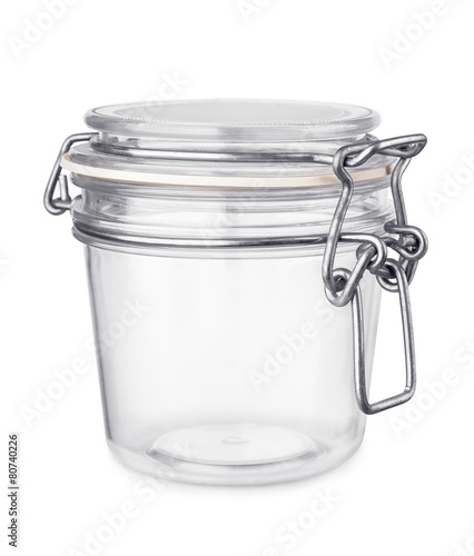 Empty glass jar isolated on white