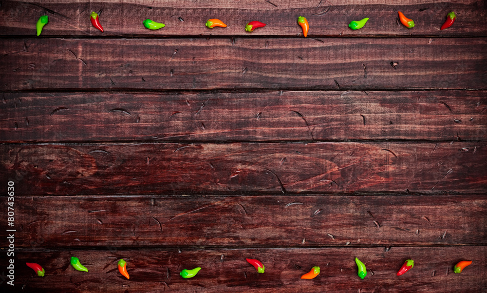 Background: Chile Pepper Decorations on Mexican Tabletop Stock Photo
