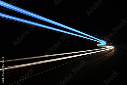 Car light trails in the tunnel. photo