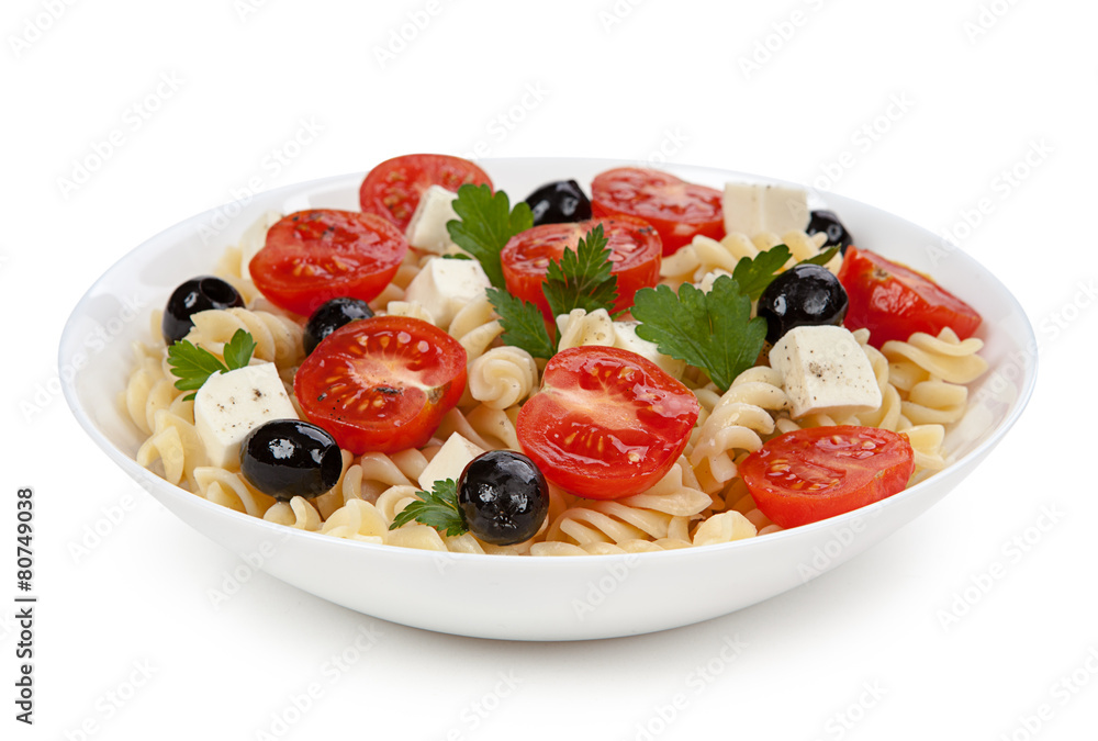 Pasta salad in the plate isolated on white background