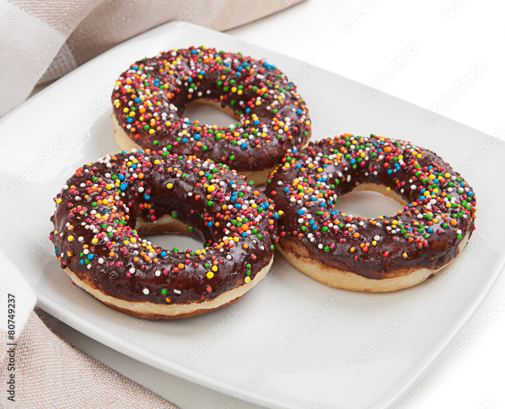 Donuts with chocolate on a plate Donuts with chocolate on a plate
