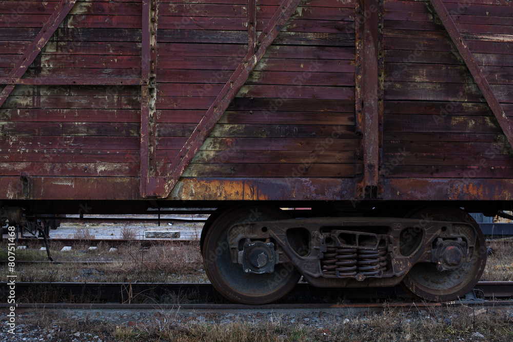 Old steam engine train wheels and parts close-up