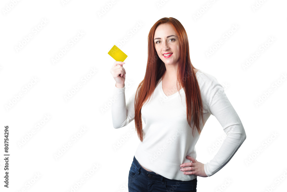 Young smiling redhead woman holding gold credit card Young smiling redhead woman holding gold credit card