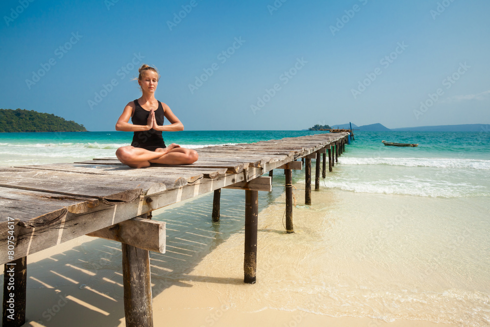 Summer yoga session in beautiful tropical island Summer yoga session in beautiful tropical island