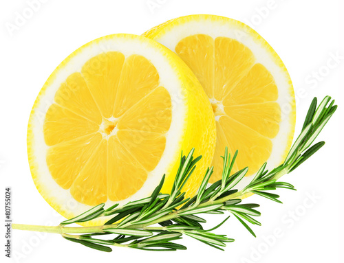 Juicy lemon with a sprig of rosemary on isolated background