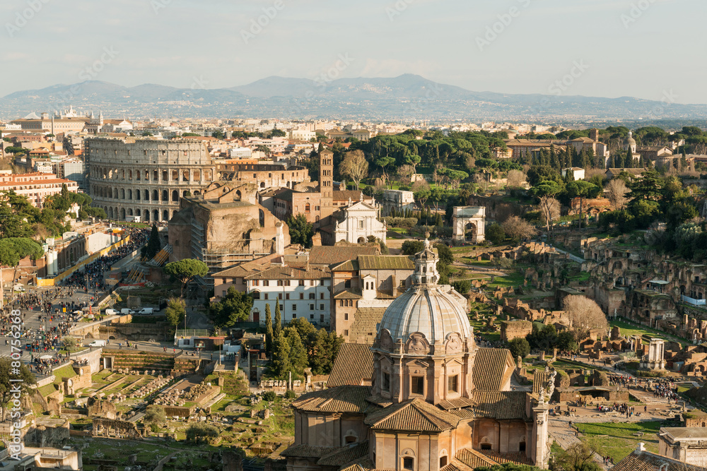 Panorama of Roman Forum ruins and Colosseum, Italy