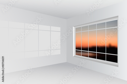Empty lounge area with large bay window