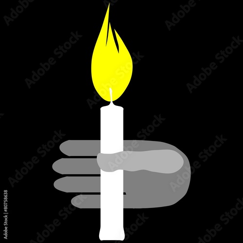 Hand with burning candle isolated on black background