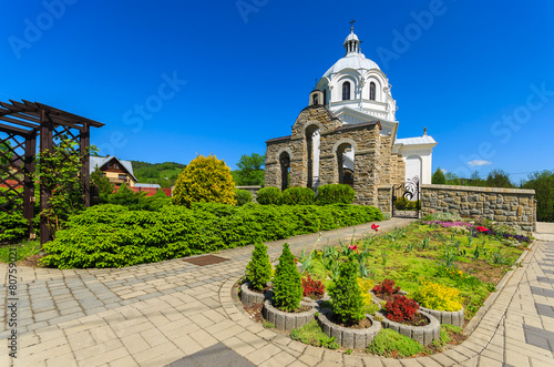 Beautiful park and white church in Pieniny Mountains, Poland