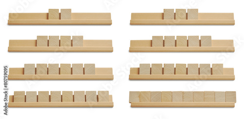 Collection of blank wood tiles isolated on white background photo