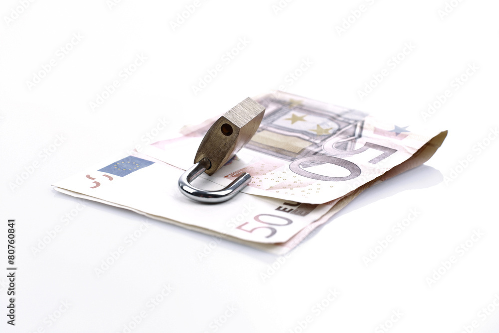 Euro banknotes and a lock. Euro banknotes and a lock.