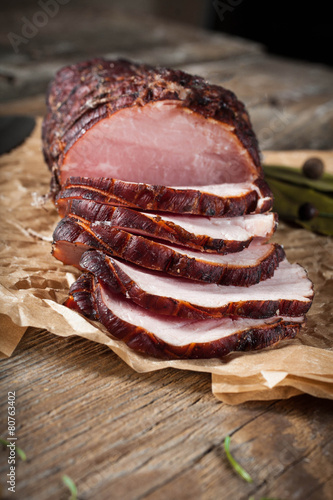 Smoked ham on a chopping board.