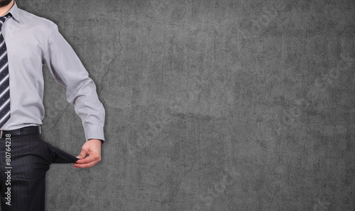 Fotografija man with pockets turned inside out