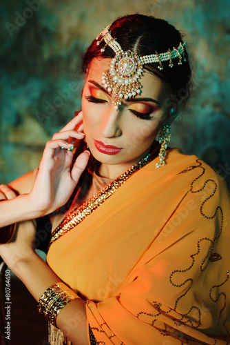 Young beautiful woman in indian costume