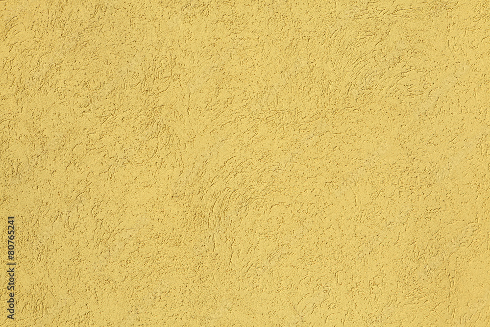 Yellow stucco wall. Background texture.