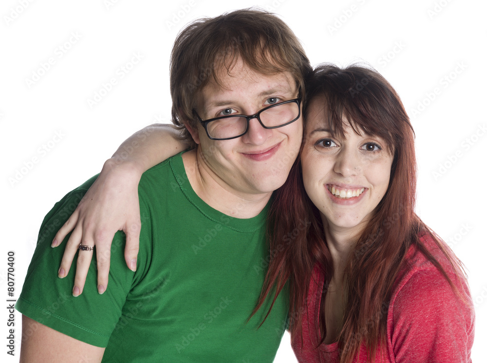 Happy Young Sweet Couple Looking at the Camera Happy Young Sweet Couple Looking at the Camera