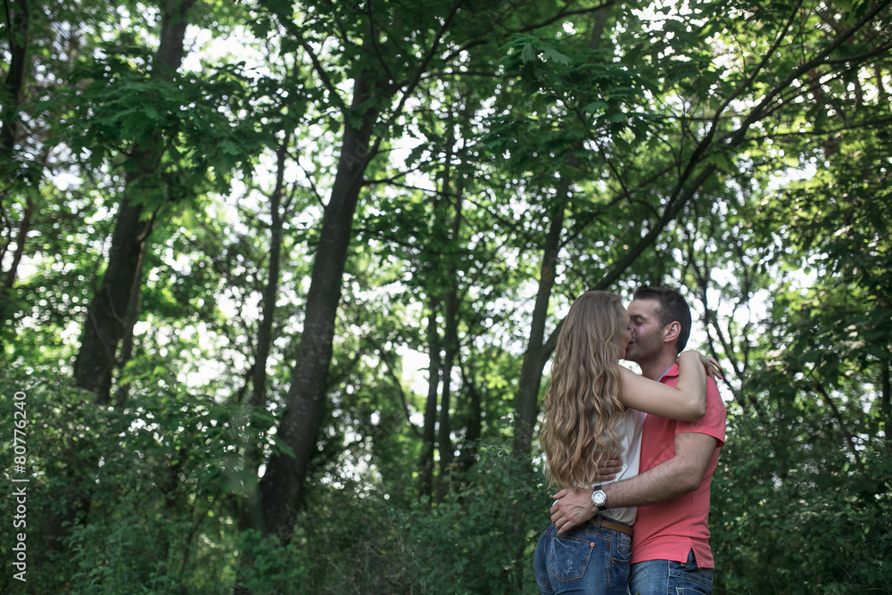 Cute couple in a forest Cute couple in a forest