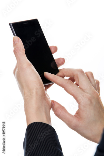 woman's hands dialling on a mobile phone