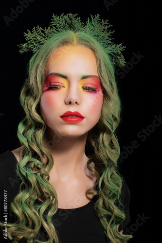 Stylish Woman with Dyed hairs and Extravagant Makeup