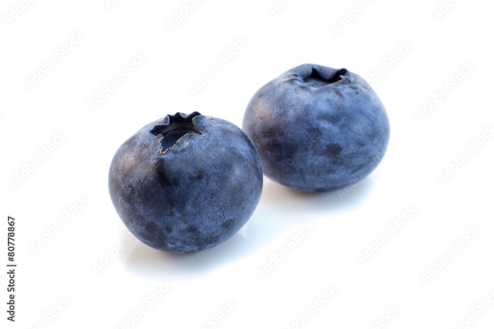 Pair of blueberries isolated on a white background Pair of blueberries isolated on a white background