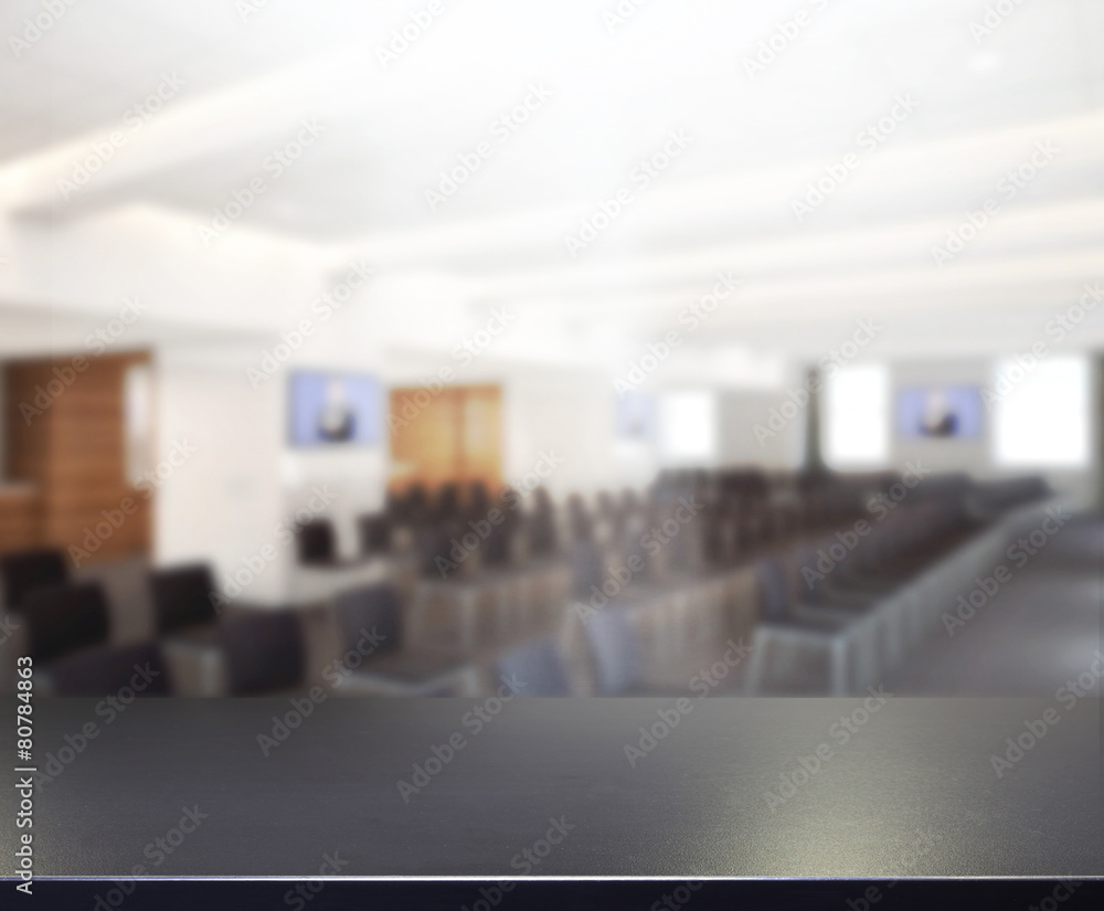 Fototapeta premium Table Top And Blur Office Background