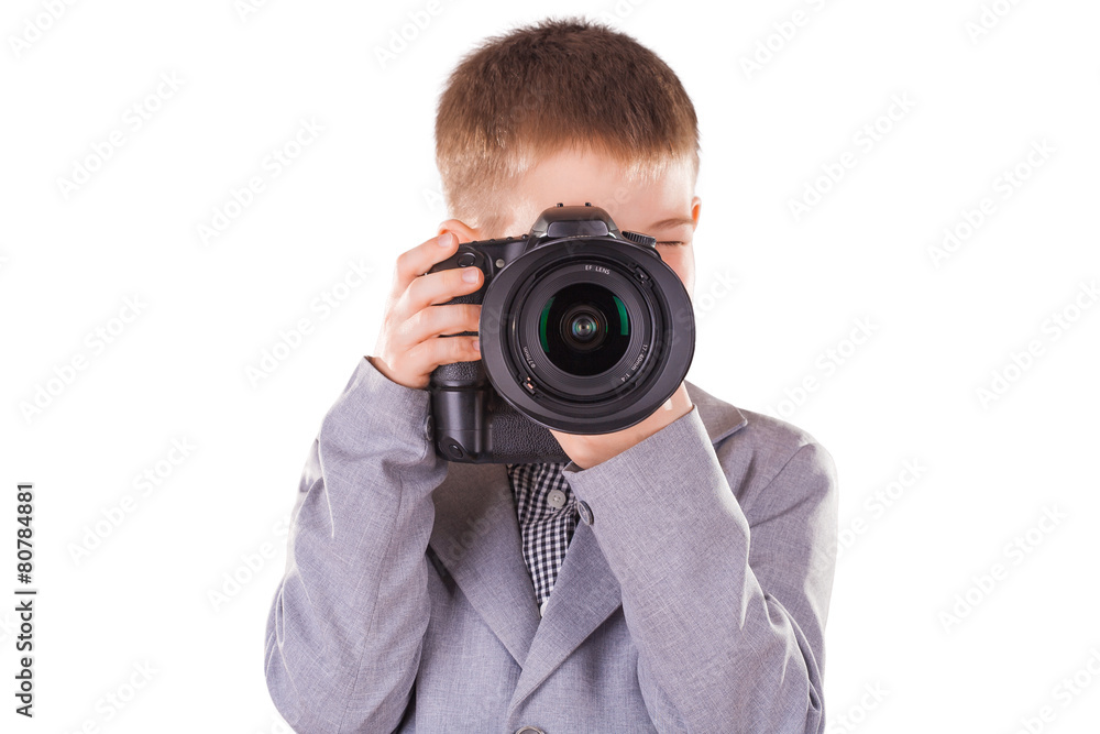 kid holding a dslr camera isolated on the white kid holding a dslr camera isolated on the white