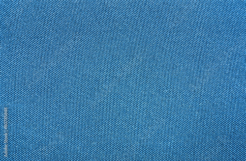 Texture of a blue woven synthetic waterproof fabric