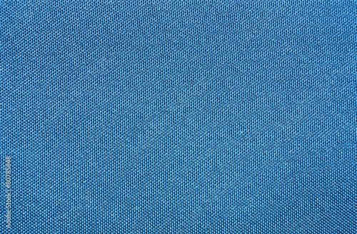 Texture of a blue woven synthetic waterproof fabric