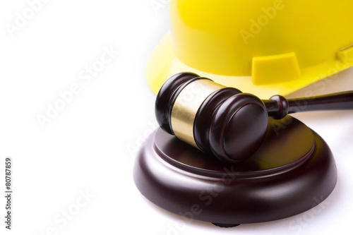 judge hammer and worker helmet photo