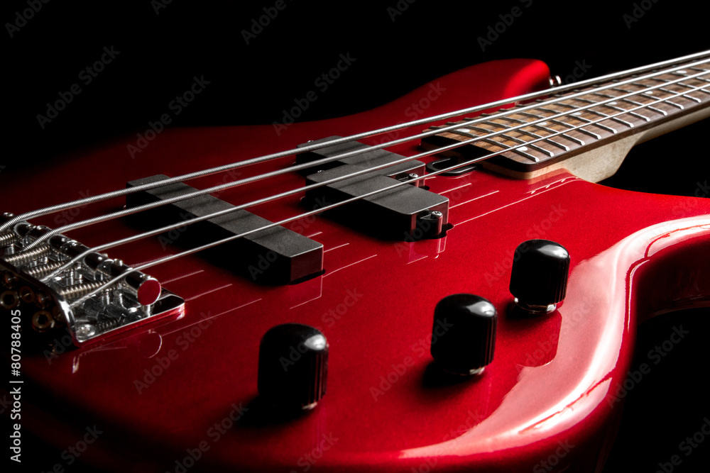 Fototapeta premium Bass guitar close-up. Photo in low key