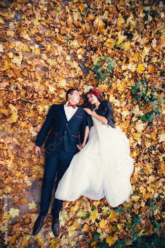 Autumn wedding photo of bride and groom photo