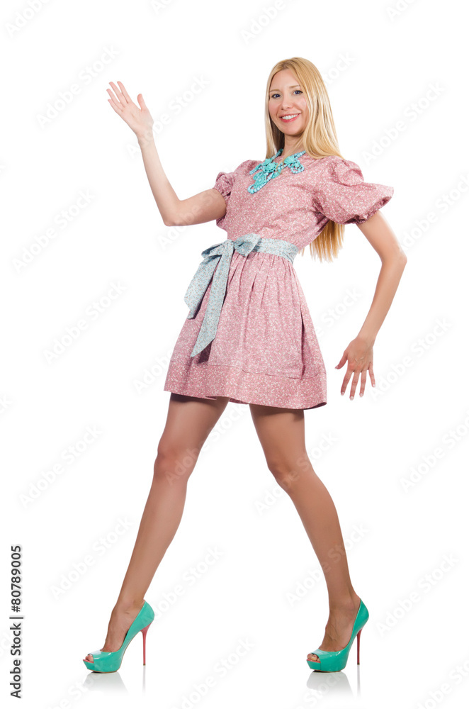 Woman in pink doll dress isolated on white