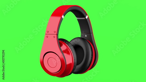 red and black wireless headphones loop rotate on green