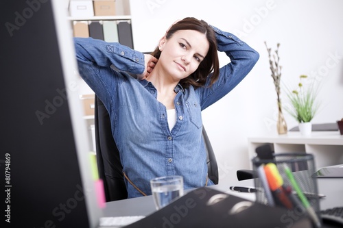 Exhausted Office Woman Holding her Head and Neck