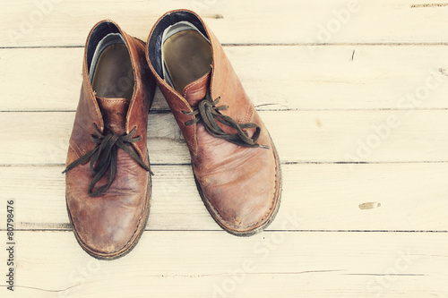 Vintage,Leather shoes on wood