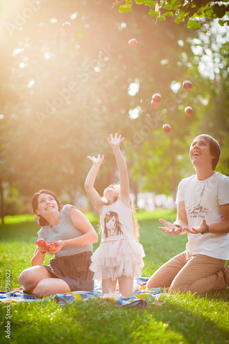 family throws apples