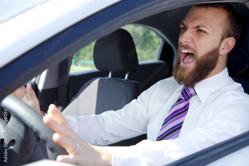 Business man shouting car accident