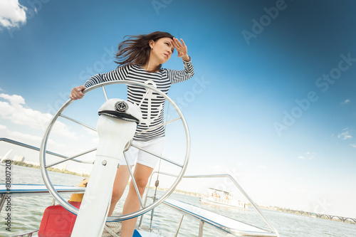 girl captain of the yacht © lobodaphoto