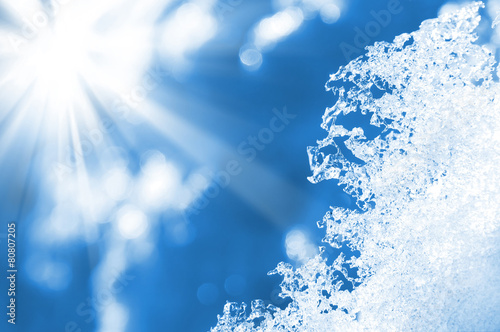 фотографія Spring background with shiny melted snow