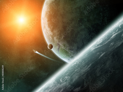 Fototapeta Naklejka Na Ścianę i Meble -  Sunrise over planets in space