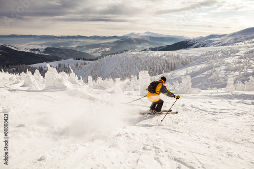Man Snow Skiing Against Blue Sky
