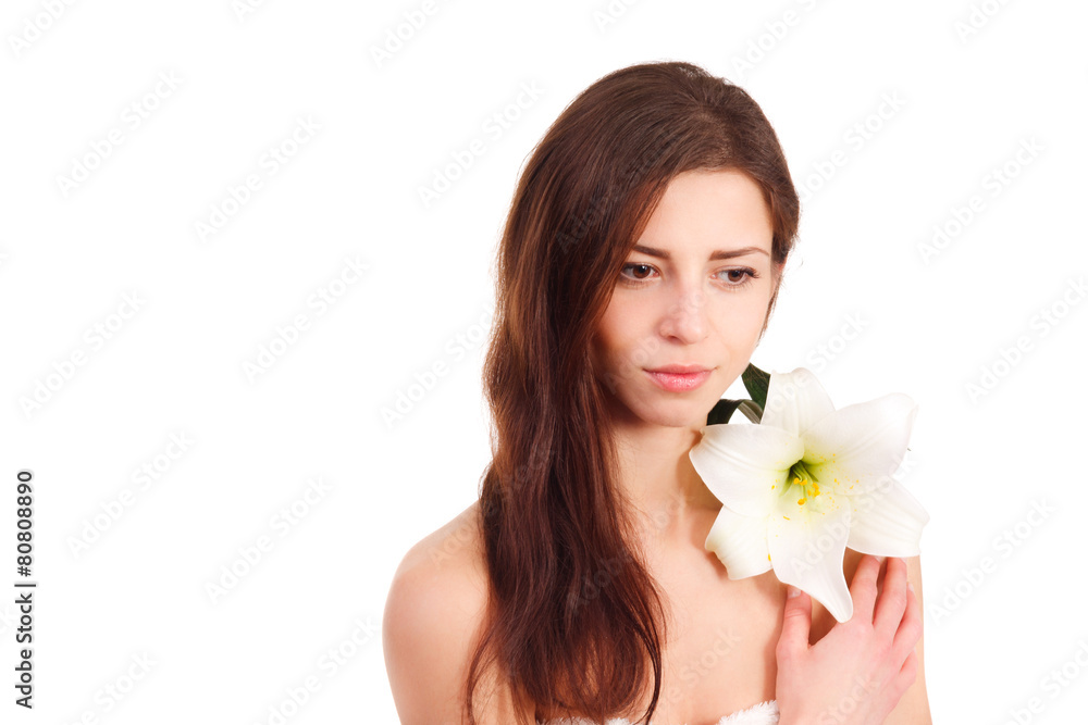 portrait of beautiful woman with perfect skin holding lily portrait of beautiful woman with perfect skin holding lily