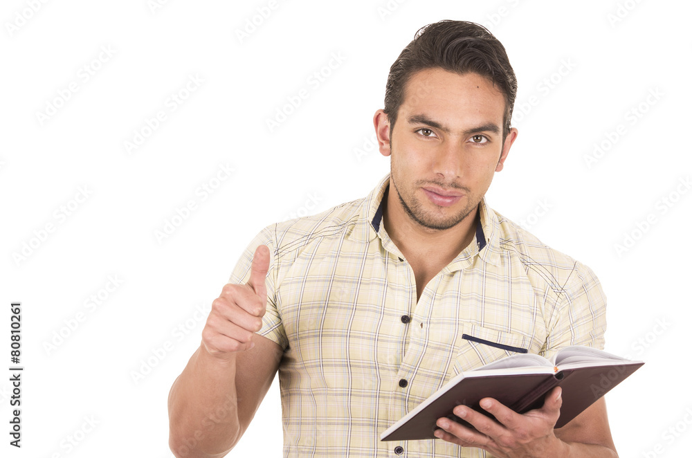 young handsome male teacher holding notebook young handsome male teacher holding notebook