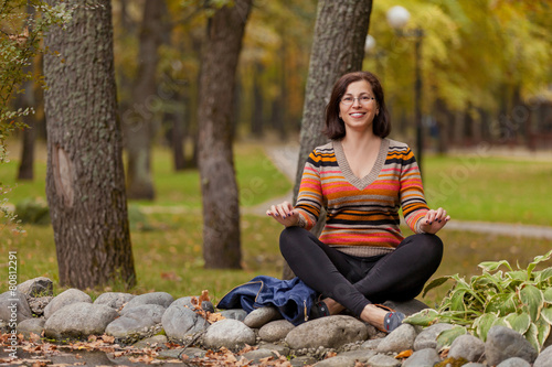 The woman in autumn park