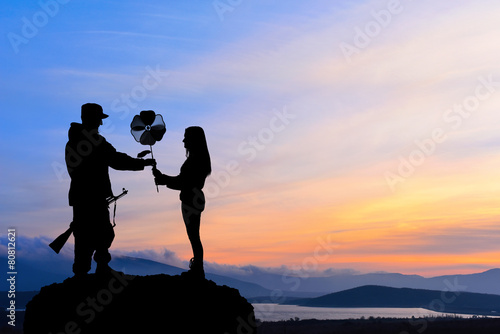 Fotografie Silhouette of peace and love versus war and anger. No war