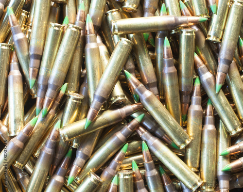 rifle ammo with green tip bullets